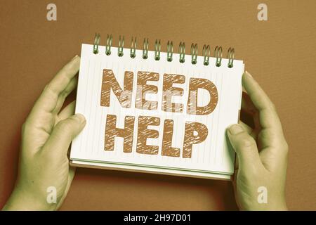 Textunterschrift mit Hilfebedürfnis. Geschäftskonzept, wenn jemand unter Druck steht und nicht mit der Situation umgehen kann, kreative Designs zu zeichnen Stockfoto
