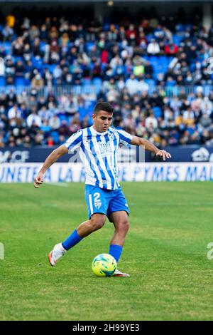 Malaga, Spanien. 05th Dez 2021. Victor Gomez von Malaga CF in Aktion beim LaLiga SmartBank Spiel zwischen Malaga CF und SD Amorebieta im La Rosaleda Stadium. Endergebnis; Malaga CF 1:2 SD Amorebieta. Kredit: SOPA Images Limited/Alamy Live Nachrichten Stockfoto