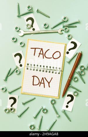 Schreiben mit Text Taco Day. Business-Ansatz Festtag, der zum Konsum von Tacos in den USA fördert New Repair Ideas Brainstoming für Stockfoto