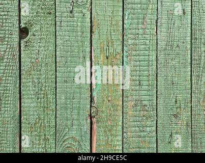 Raue alte Holzplanken in grüner Farbe als Texturhintergrund lackiert Stockfoto