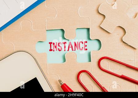 Text, der das Exemplar der Inspiration zeigt. Konzept, das ein Beispiel oder ein einzelnes Auftreten einer bestimmten Situation bedeutet, die ein unvollendetes Weiß baut Stockfoto