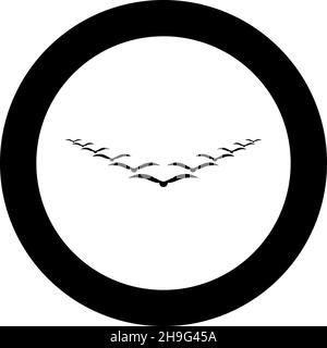 Vogelschwarm, der im Keil am Himmel fliegt Führungs-Konzept Migration Silhouette Symbol im Kreis rund schwarz Farbe Vektor Illustration Bild Stock Vektor
