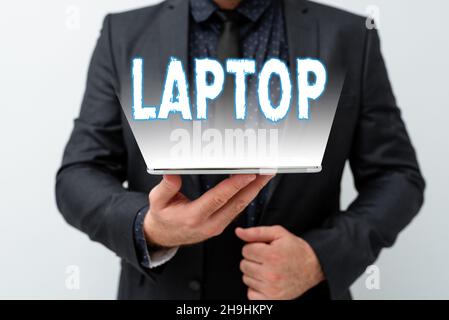 Handschrift Text Laptop. Wort für Computer, der tragbar ist und für den Einsatz auf Reisen geeignet ist, um Ideen für neue Technologien zu diskutieren Stockfoto