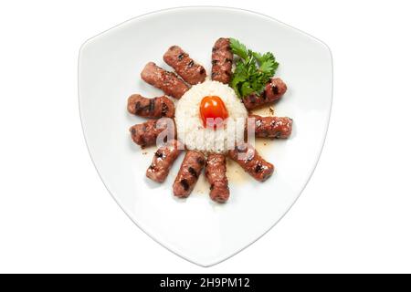 Türkische Kebab-Inegol-Fleischbällchen und Reispilaf Stockfoto