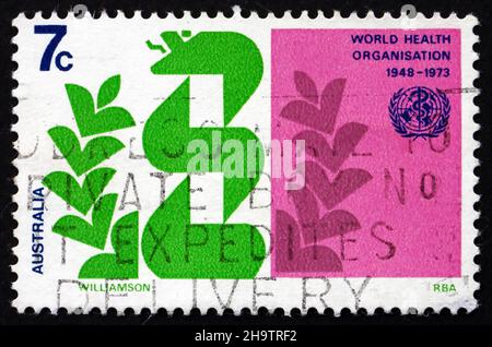 AUSTRALIEN - UM 1973: Eine in Australien gedruckte Briefmarke zeigt stilisierte Caduceus und Laurel, 25th. Jahrestag der WHO, um 1973 Stockfoto