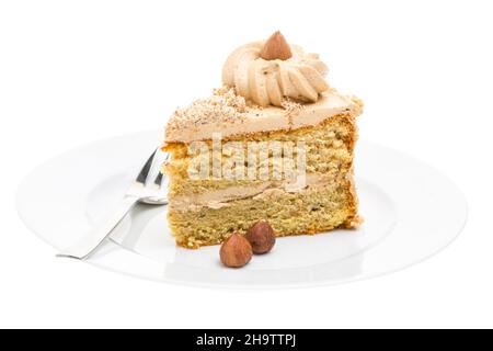 Nusskuchen, Nusskuchen, eine, Stück, Nüsse, Haselnuss, Gabel, Teller, weiß, Hintergrund, Daneben, einzeln, allein, Kuchendekoration, Creme, Braun, Dessert, sma Stockfoto