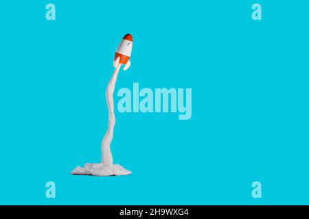 3D Cartoon Raketenstart auf blauem Hintergrund. 3D Rendern. Stockfoto