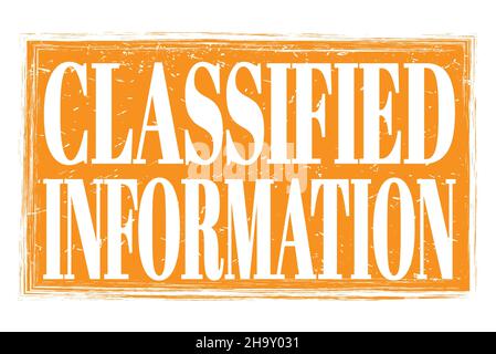 CLASSIFIED INFORMATION, words written on orange grungy stamp sign Stockfoto