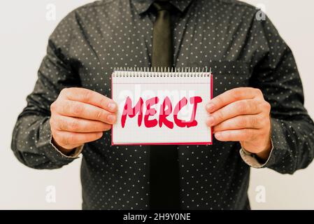 Handschrift Text Merci. Konzept, das bedeutet, was gesagt wird, oder eine Antwort, wenn Ihnen jemand in Frankreich hilft Vielen Dank, dass Sie neue Pläne und Ideen vorgestellt haben Stockfoto