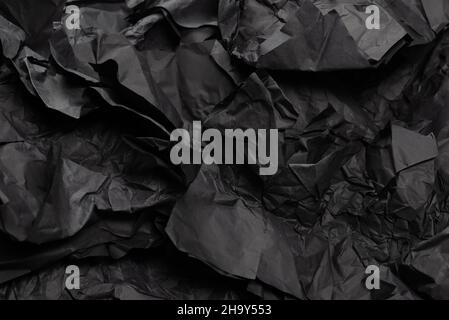 Abstrakter schwarzer Papiertextur-Hintergrund. Draufsicht. Speicherplatz kopieren. Stockfoto