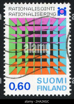 FINNLAND - UM 1974: Stempel gedruckt von Finnland, zeigt Symbole, Abzeichen, um 1974 Stockfoto