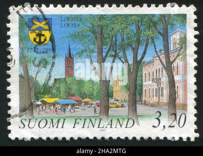 FINNLAND - UM 1995: Briefmarke gedruckt von Finnland, zeigt Stadt Loviisa, um 1995 Stockfoto