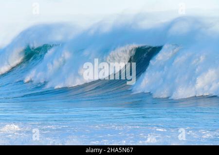 Wellenreiten in sandown Bay, westlichem Kap, Südafrika. Stockfoto