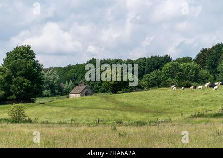 Die kleine Kirche von St. Oswald's, Swinbrook und Widford, Oxfordshire, England Stockfoto