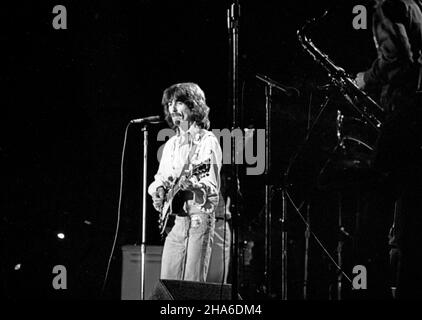 George Harrison in concert Crica 1970s Stockfoto