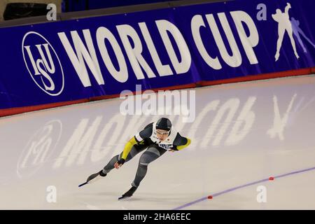 Calgary, Alberta, Kanada. 10th Dez 2021. ARISA GO aus Japan nimmt am Eisschnelllauf-Wettbewerb womenÃs 500m, ISU World Cup, beim Olympischen Oval in Calgary, Alberta, Kanada, Teil. (Bild: © Dave Chidley/ZUMA Press Wire) Stockfoto