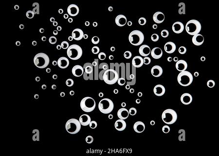 Viele schöne Augen auf schwarz Stockfoto