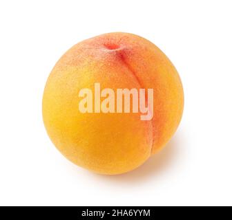 Ein gelber Pfirsich auf weißem Hintergrund Stockfoto