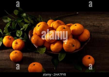 Baby Orange Santang Madu ist eine Art Orange aus China mit einem süßen Geschmack und verlockenden Aroma. Diese Frucht wird oft während des chinesischen Neujahrs ce verzehrt Stockfoto