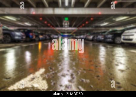 Abstrakter unscharfer Hintergrund des Parkplatzes Stockfoto