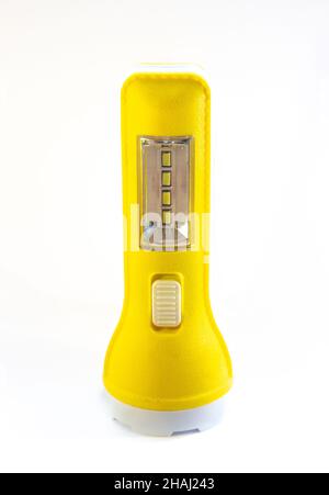 Gelbe Taschenlampe isoliert auf weiß Stockfoto
