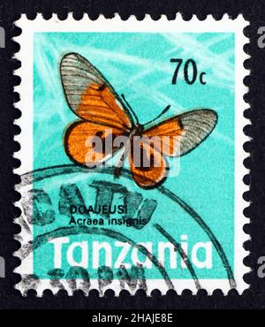 TANSANIA - UM 1973: Eine in Tansania gedruckte Briefmarke zeigt schwarz-fleckige Acraea, Acraea Insignis, Butterfly, um 1973 Stockfoto