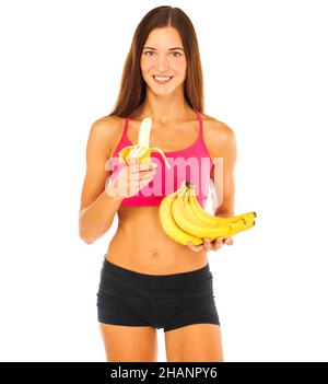 Porträt eines jungen schönen Mädchen mit Bananen, isoliert auf weißem Hintergrund Stockfoto