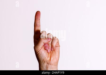 Eine Hand mit 1 Finger Stockfoto