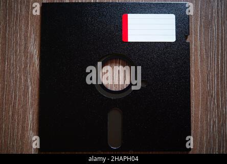 Diskette mit rotem Beschriftungshintergrund Stockfoto