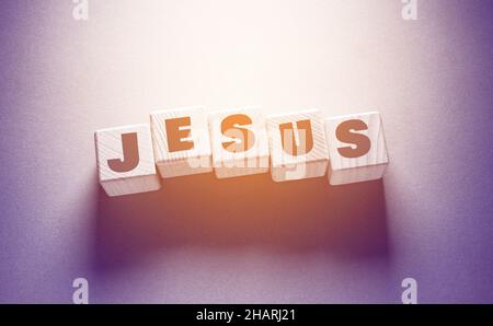 Jesus Wort geschrieben auf Holzwürfel Stockfoto