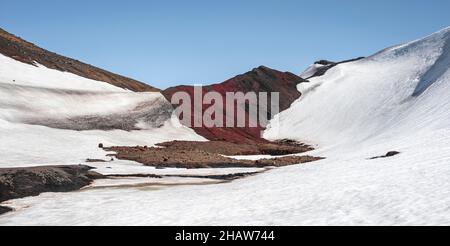 Fimmvoerouhals Wanderweg, karge vulkanische Landschaft mit Schnee, Porsmoerk Nature Reserve, Suourland, Island Stockfoto