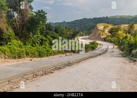 Straßenarbeiten auf der Insel Siquijor, Philippinen. Stockfoto