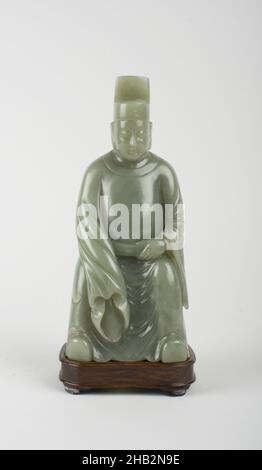 Sitzende Figur eines Hofbeamten, Chinesisch, Qing-Dynastie, 1644–1911, Qianlong-Periode, 1736–1795, Mitte bis Ende des 18th. Jahrhunderts, Jade (Nephrit), hergestellt in China, Asien, Jades, Skulptur, 7 3/4 x 3 x 3 1/2 Zoll (19,7 x 7,6 x 8,9 cm Stockfoto