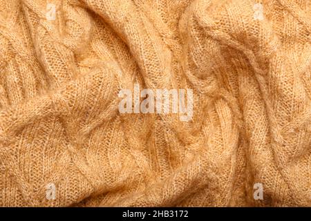 Textur aus gestricktem, zerknittertem Stoff als Hintergrund Stockfoto