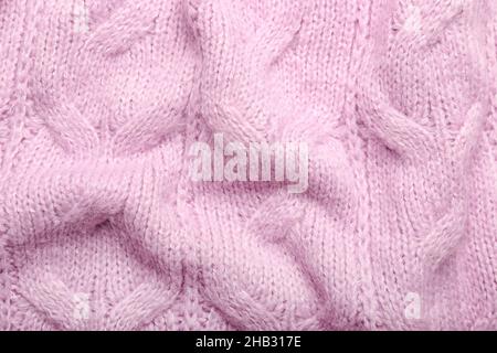 Struktur aus zerknittertem Strickmaterial mit stilvollem Muster als Hintergrund Stockfoto
