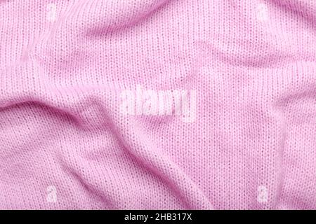 Gestrickte Knitterware als Hintergrund Stockfoto