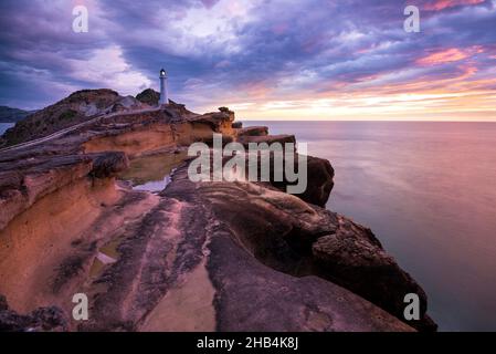 Castle Point Lighthouse, in der Nähe des Dorfes Castlepoint in der Region Wellington auf der Nordinsel Neuseelands Stockfoto