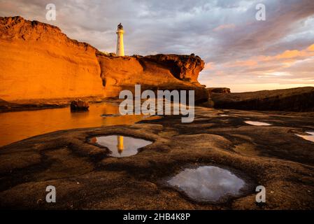 Castle Point Lighthouse, in der Nähe des Dorfes Castlepoint in der Region Wellington auf der Nordinsel Neuseelands Stockfoto