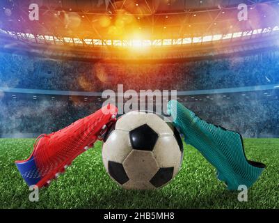 Soccer shoes on playground of a big stadium Stockfoto