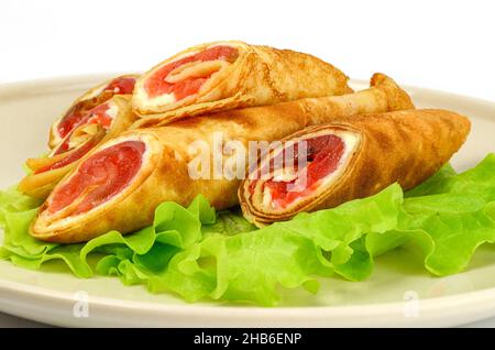 Drei Tortillas auf einem Salatblatt Stockfoto