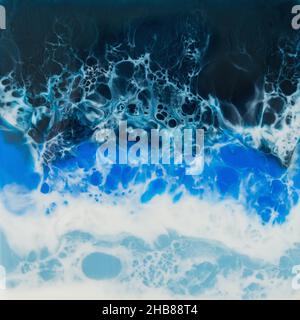 Kunstharz mit leuchtend blauen Farben. Hintergrund mit Epoxideffekt Stockfoto