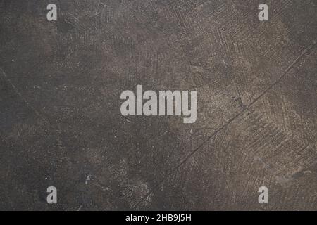 Vintage- oder rauer dunkelbrauner Hintergrund aus Naturstein mit alter Textur als Wand mit Retro-Muster. Hochwertige Fotos Stockfoto