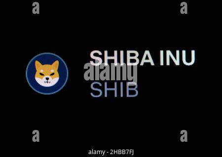 Villingen Schwenningen, Deutschland. 14th Dez 2021. Das Logo der Kryptowährung Shiba Inu (SHIB) ist auf der Handelsplattform Coinbase zu sehen. Kredit: Silas Stein//dpa/Alamy Live Nachrichten Stockfoto