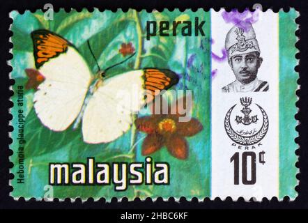 MALAYSIA - UM 1976: Eine in Malaysia gedruckte Briefmarke zeigt Great Orange Tip, Hebomoia Glaucippe Aturia, Butterfly, um 1976 Stockfoto