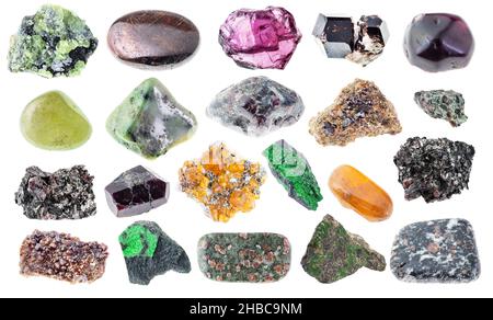 Set aus verschiedenen Granatsteinen auf weißem Hintergrund Stockfoto