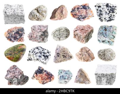 Set aus verschiedenen Granitsteinen auf weißem Hintergrund Stockfoto