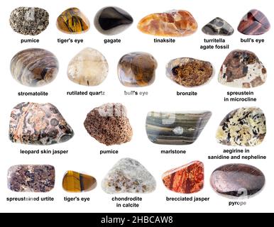 Set aus verschiedenen braunen Mineralien mit Namen auf weißem Hintergrund Stockfoto