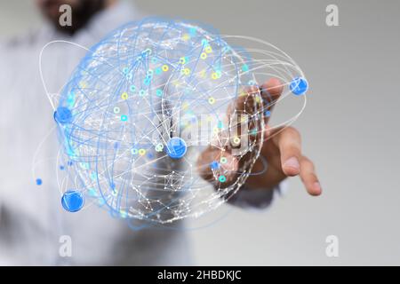 Eine Person, die die Darstellung der Erde von 3D berührt Stockfoto