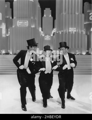 Buddy Ebsen, Eleanor Powell und George Murphy machen Eine Routine am Set der Broadway-Melodie von 1938 Stockfoto