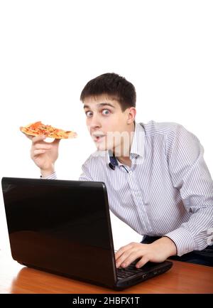 Überrascht Teenager mit Laptop und Pizza isoliert auf dem Weißen Stockfoto